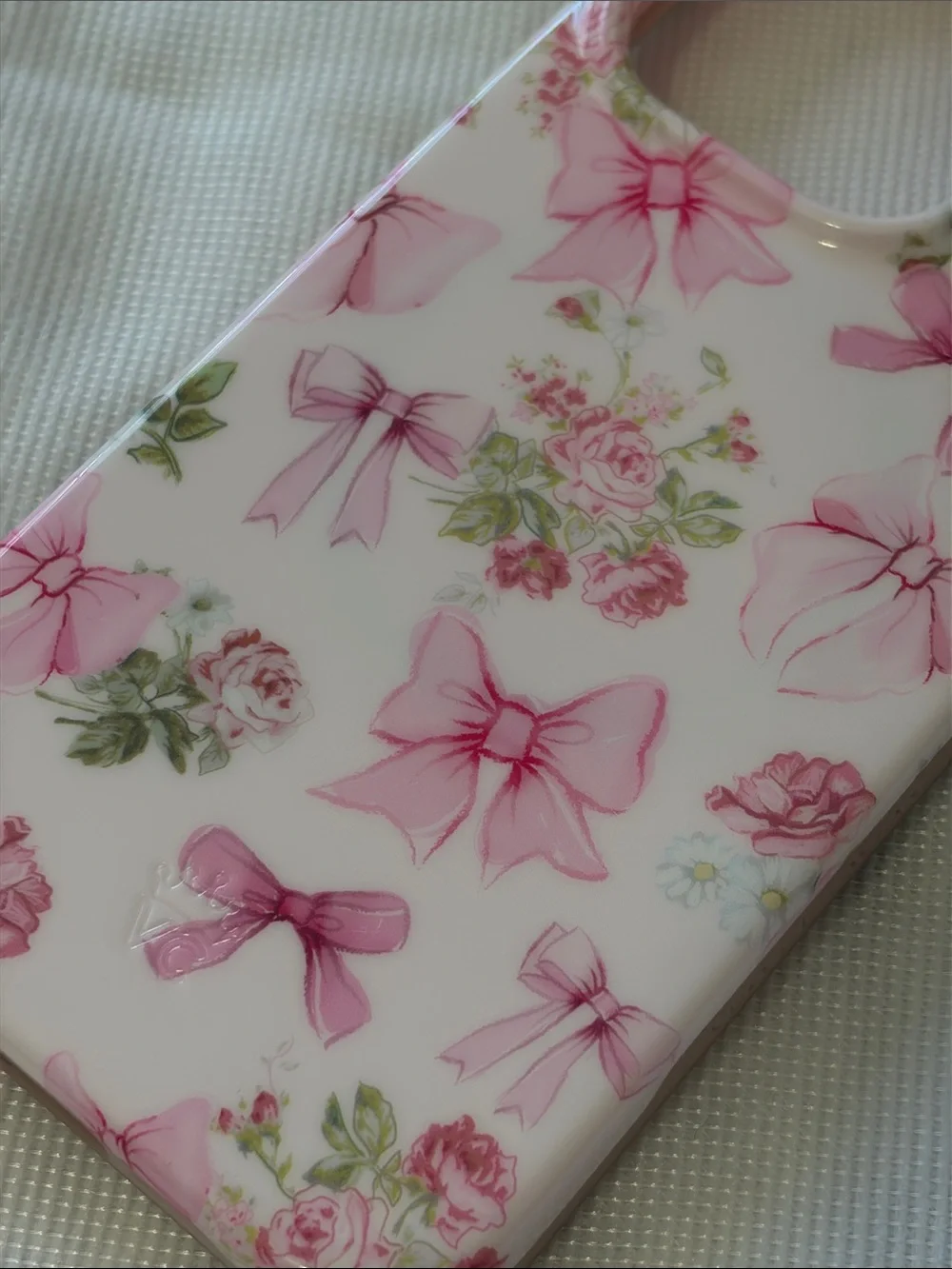 Velvet Caviar Pink Floral Bow iPhone 14 Pro Case